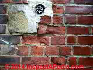 Spalling brick below vent (C) Daniel Friedman